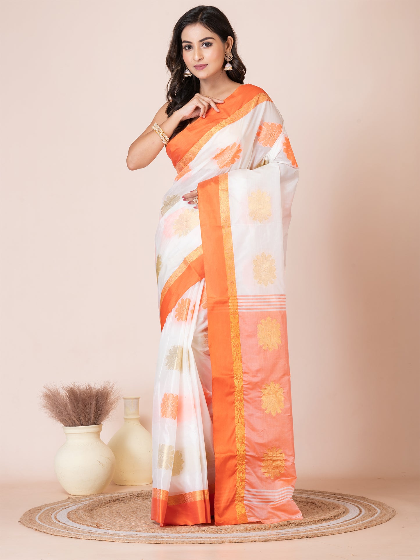 ITARA White & Orange Silk Floral Design Zari Work Tussar Saree