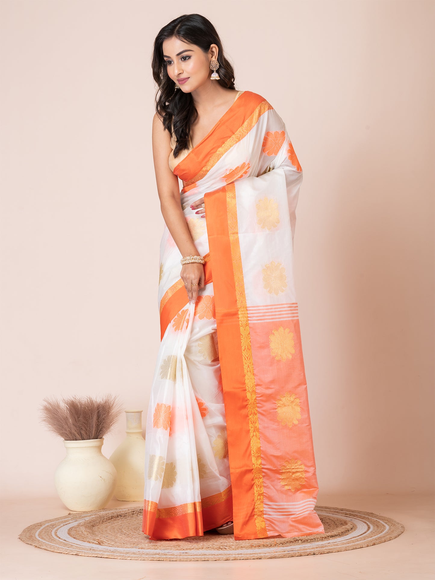 ITARA White & Orange Silk Floral Design Zari Work Tussar Saree