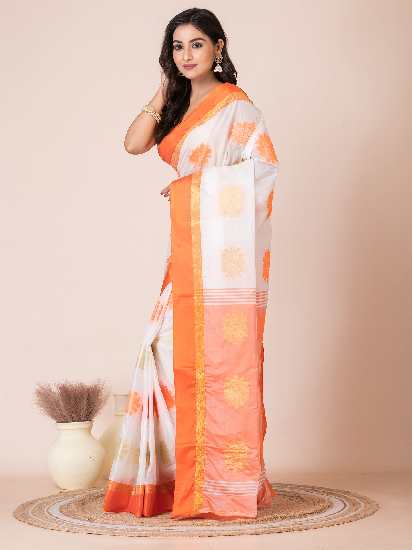 ITARA White & Orange Silk Floral Design Zari Work Tussar Saree