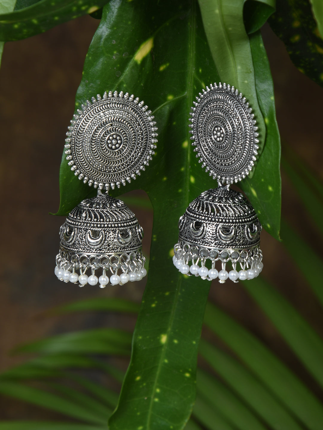 ITARA Silver-Toned Dome Shaped Jhumkas